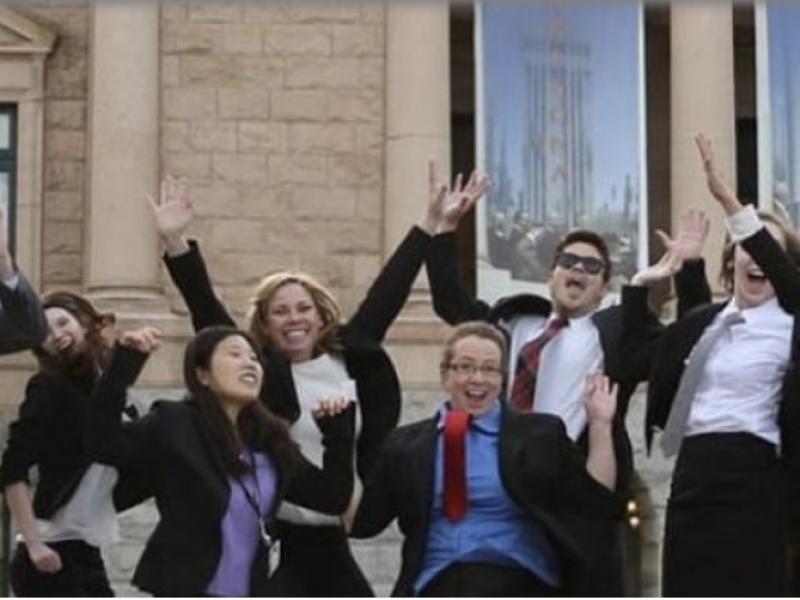 Interns jumping in front of AZ state capital.